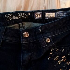 Miss me, size 27, and dark blue with sequins on the front